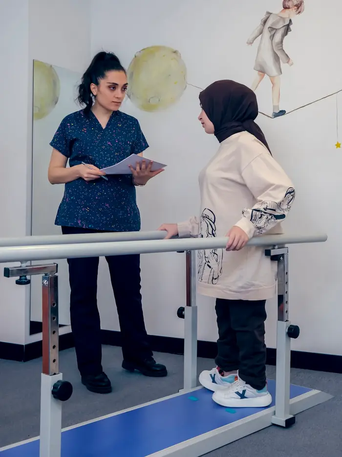 A Cynergy therapist guiding a patient